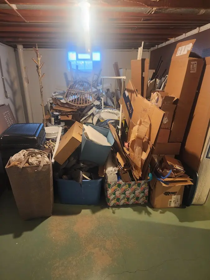 Roll-off dumpster container at job site for 4 Yard Dumpster Rental in Huxley